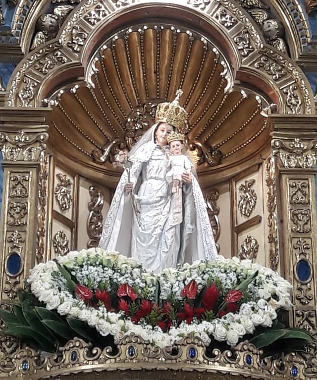 Our Lady of the Cloud with the Child Jesus in her shrine niche