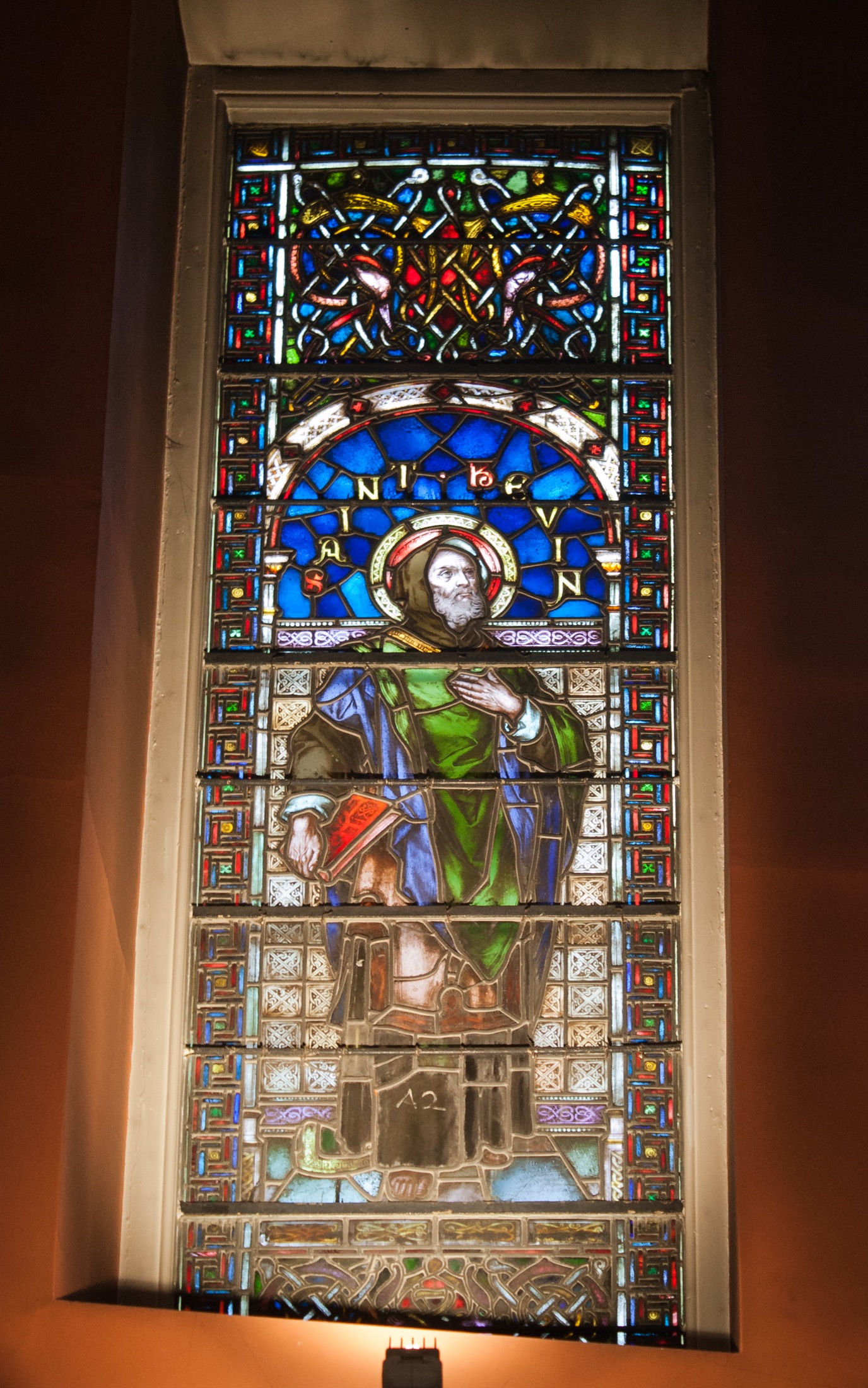 Stained-glass image of Saint Kevin